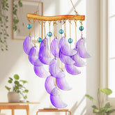 Hyaline Dora glass moon wind chime for outdoor use, creates tranquil garden ambiance.