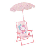 Idea Nuova Hello Kitty kids' chair with umbrella, open on the beach for shade and comfort.
