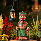 IDEA SHOW solar tiki statue in garden glows warmly for evening ambiance
