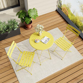 IDEALHOUSE bistro table and chairs set in yellow for compact outdoor dining.