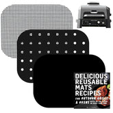 Infraovens woodfire grill Pro XL liners on the cooking surface for easy cleanup.