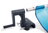Intex 28051E solar cover reel being installed on a rectangular above-ground pool for easy cover management