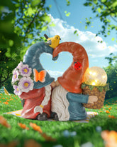 istatue solar kissing gnomes outdoors with sun-powered glow for evenings