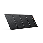 Jackery SolarSaga 40W Air folded book-size panel for easy backpack storage and travel charging.
