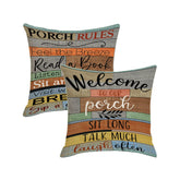 Jartinle porch rules sign pillow cover adds rustic charm to outdoor seating.