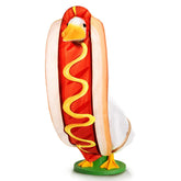 JcHrmers hot dog goose outfit on a cement goose statue for playful yard decor