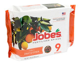 Jobe’s Fruit & Citrus Fertilizer Spikes inserted around a tree’s dripline for targeted feeding.