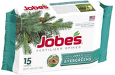 Jobe's Organics evergreen spike placed around a shrub for year-long feeding.