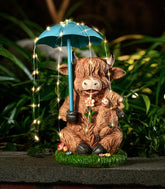 Joint Honglin Highland cow umbrella light statue for cozy evenings in the garden