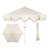 Jonathan Y UMB1001E cream umbrella with fringe edge adds cottage charm to outdoor spaces.