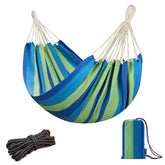 JoyView Brazilian hammock blue stripes bed area stretched for lounging on a patio