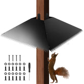 JTNFSH metal squirrel baffle on a 4x4 post blocks climbs to protect feeders.