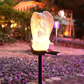 Juliahestia Guardian Angel garden statue glows softly for serene evenings.