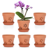JUXYES pack of six terracotta orchid pots with holes and saucers for stable orchid display.