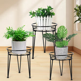 Jvtoo metal plant stand with three-legged design for sturdy plant support.