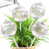 JXWENBYX 17oz glass watering globe provides steady moisture for potted plants.