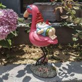 Jy.Cozy gnome on flamingo statue adds tropical whimsy to outdoor space
