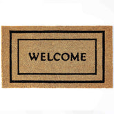 KANKUN Coco Coir Doormat at front door showing dirt scraping action