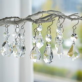 Kanpura crystal prisms varied shapes sparkle with rainbow reflections in sunlight