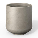 Kante 11.6-inch round concrete planter finish with visible pores for a modern look