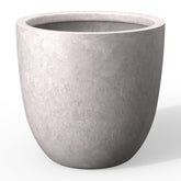 Kante 14-inch round concrete planter with lion head embossing adds bold focal point