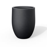 Kante tall concrete planter with 21.7-inch height for a striking vertical display.