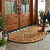 Kempf Sunburst Half Round Doormat greets guests and traps dirt at the threshold.