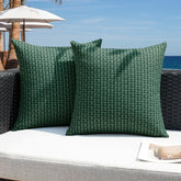 Kevin Textile dark green outdoor pillow cover with waterproof coating for rain-ready patio decor.