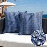 Kevin Textile outdoor waterproof navy pillow cover protects cushions from splashes.