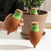 KGCCIZI Ollas water globes in a large pot delivering slow, even moisture