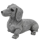 KH866 dachshund statue in garden decor, showcasing durable resin and weather-friendly charm.