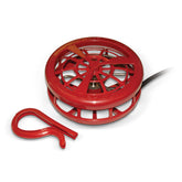 K&H Pet Products deicer floats in a stock tank, keeping an open drinking area for livestock.