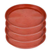 Kichwit plant saucer brown round under-pot catching drips and protecting floors.