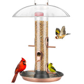 Kingsyard metal bird feeder outdoors with a protective dome for dry seeds.