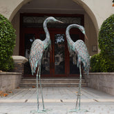 Kircust garden crane statue in standing pose adds elegant yard decor.