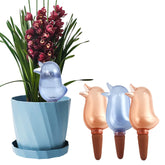 KIROYAL bird-shape watering spike in red provides steady moisture for potted plants.