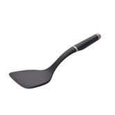 KitchenAid Gourmet Large Solid Turner head close-up showing reinforced nylon durability.