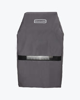 KitchenAid grill cover for 28-inch grills in gray protects from rain and dust.