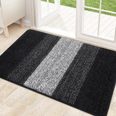 Kitinjoy front door mat absorbs moisture and dirt at the threshold.