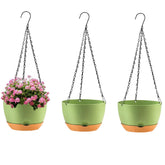 KPUVX 10-inch self-watering hanging planter with removable saucer for convenient plant care.