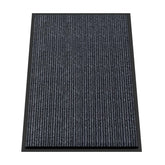 Kuyal front door mat with textured PVC backing for secure, non-slip entry.