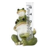 La Crosse frog rain gauge polyresin figurine measures rainfall in the garden.