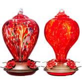 LaElvish Garden hummingbird feeder glass shines in sun, adding color to outdoor space.