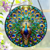 LAOWEIKI Peacock Suncatcher eight-inch glows in sunlight, brightening windows.