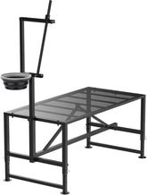 Larrik 600 lbs goat milking stand with feed bin for efficient milking sessions.