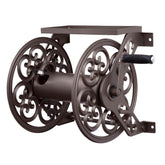 Liberty Garden 708 wall-mount hose reel bronze finish on exterior wall for tidy hoses.