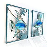 Liffy metal fish wall decor frame in blue, enhances outdoor ambiance.