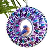 Lily's Home glass mosaic hanging bird feeder in purple and blue attracts backyard birds.