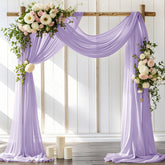 LINXTAR wedding arch drape panel in lilac creates romantic backdrop for outdoor ceremonies.
