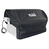 Lion Premium Grills 41738 canvas cover over a 32-inch built-in grill protects from rain and sun.